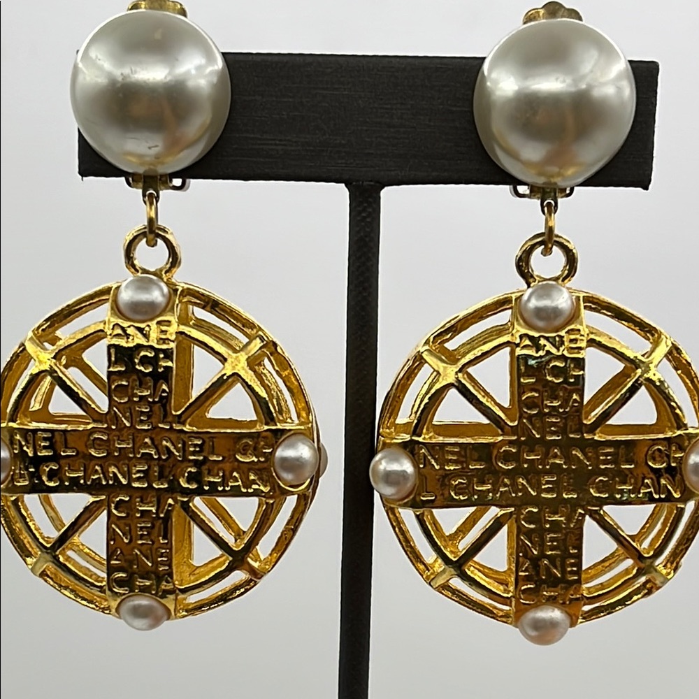 CHANEL Gold and White Statement Clip Earrings with Pearl Accents
